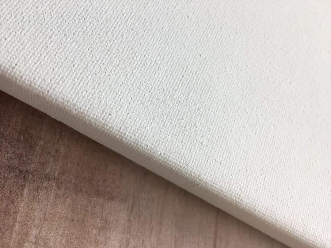 a close up view of a white fabric